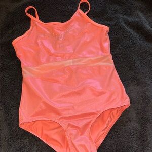 Girls Orange Shimmery Leotard. Size Large 10/12